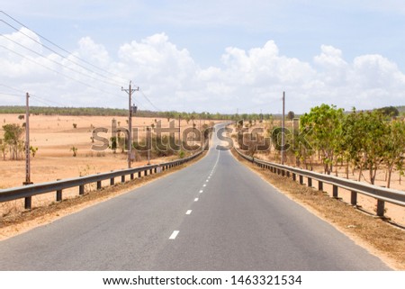 A Countryside Road Through The Small Desert in Binh Thuan Province, Vietnam