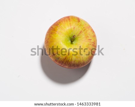 
Polish ecological apples on a white background in the sunlight. Photographing with a medium format camera with a resolution of 50 MP