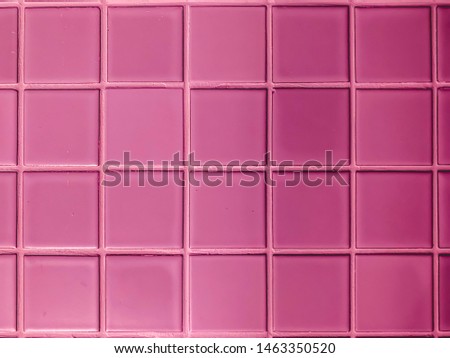 real photo of colorful bright pink tiles  square mosaictiles wall of the bathroom