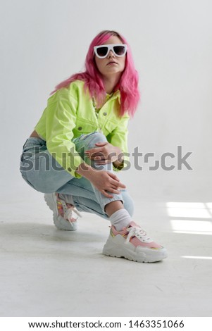 stylish fashionable woman with pink hair beauty