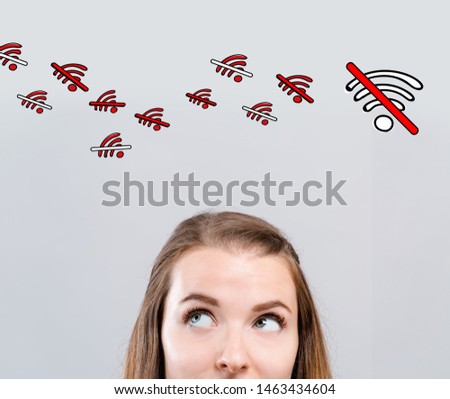 No WiFi theme with young woman looking upwards