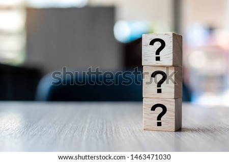 Questions Mark ( ? ) word with wooden cube block on table background. FAQ( frequency asked questions), Answer, Q&A, Information, Communication and Brainstorming Concepts Royalty-Free Stock Photo #1463471030
