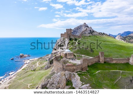 Genoese fortress in the Sudak bay on the Peninsula of Crimea. Aerial drone view Royalty-Free Stock Photo #1463514827