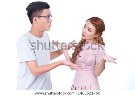 Asian handsome guy and beautiful girl young couple is shouting to each other, isolated on white background