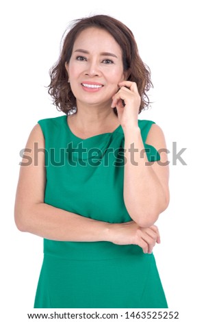 Asian woman smiling happy portrait. Beautiful mature middle aged Chinese Asian woman closeup beauty portrait isolated on white background
