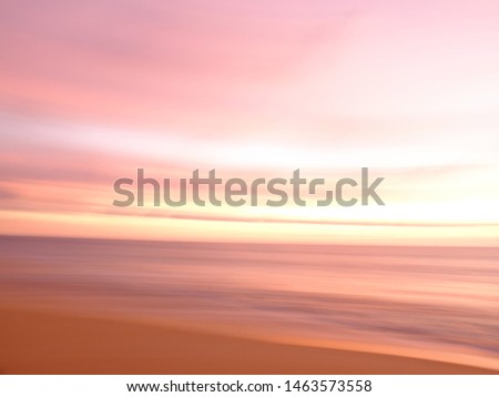 Blurred photo,Abstract beautiful seascape with motion blur sky and sea at dramatic colorful sunset.Background concept.Composition of nature.