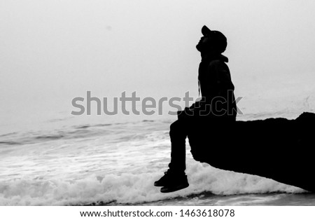 High exposure Black and White calm male in the sea