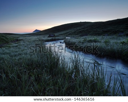 Mountain stream at dawn