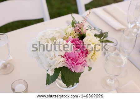 Centerpiece with Peonies at a Wedding Reception