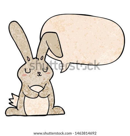 cartoon rabbit with speech bubble in retro texture style
