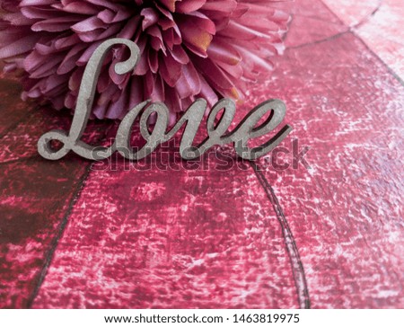word love aged on canvas and flower intense colour burgundy 
