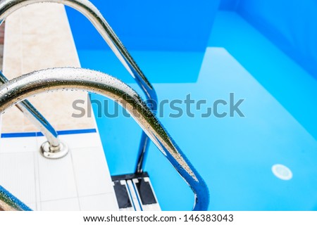 of the ladder, stainless steel basin with water drops