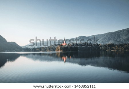 beautiful multicolored sunrise over an alpine lake Bled in Slovenia