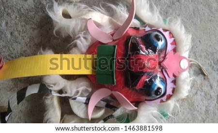 photo mask of children's toys from paper