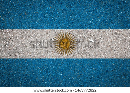 National flag of Argentina on a stone background.The concept of national pride and symbol of the country.