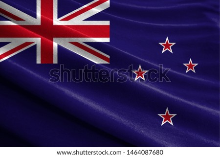 Realistic flag of New Zealand on the wavy surface of fabric