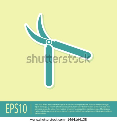 Green Gardening handmade scissors for trimming icon isolated on yellow background. Pruning shears with wooden handles.  Vector Illustration
