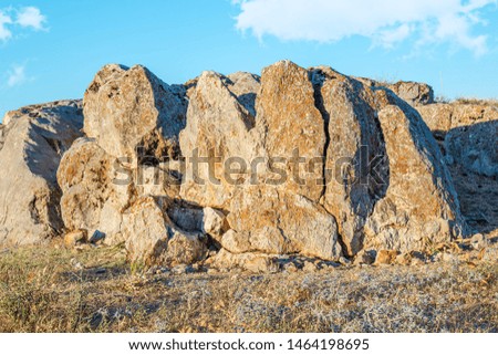 Stones rocks rocky ground against the sky