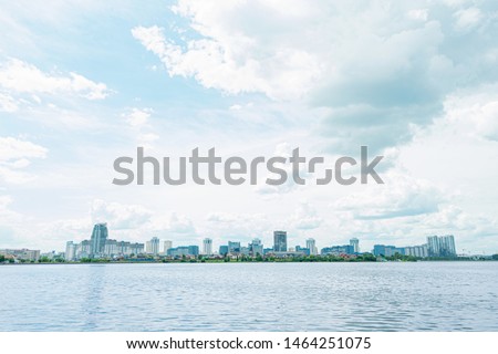 Summer day, Minsk city, apartment buildings, blue sky with clouds, copy space, toned