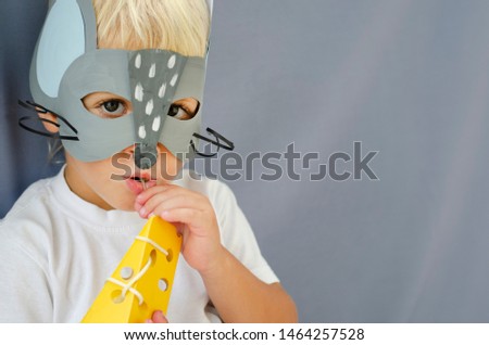 Blond boy in rat mask. Cute mouse. Postcard for the new year 2020. Happy new year 2020