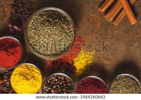 Dried Marjoram . Place for text. Different types of Spices in a bowl on a stone background. The view from the top.