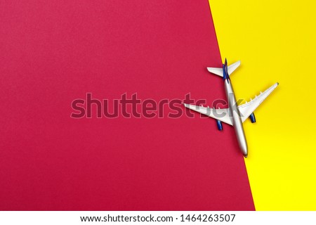 top view photo of toy airplane over color  background - Image 