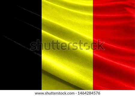 Realistic flag of Belgium on the wavy surface of fabric