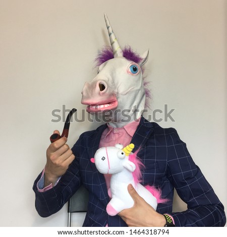Unicorn smoking pipe with a puppet unicorn
