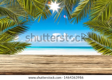 Desk of free space and beach background 