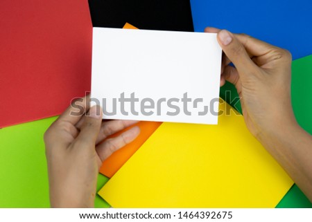 Mockup of textured paper on abstract color background.