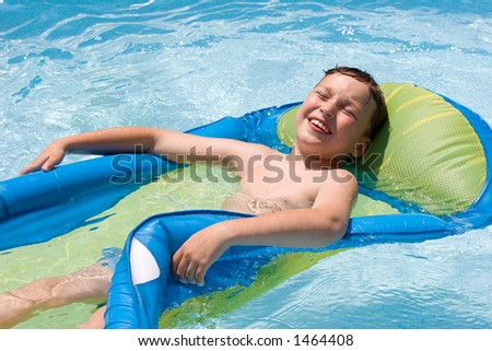 A boy in a swimming pool