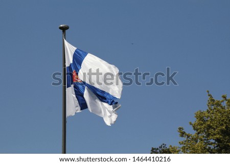 The Flag of Finland waving