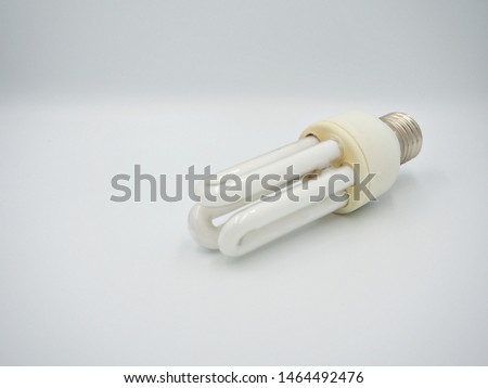 The shot on the used energy saving bulb with white background