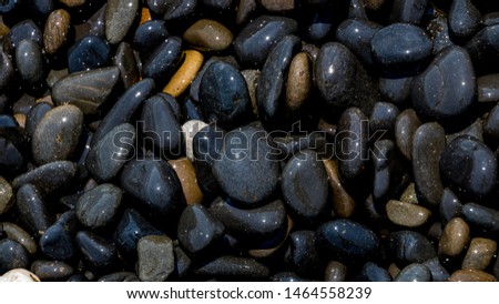 Black Volcanic Stones at Mavra Volia Beach