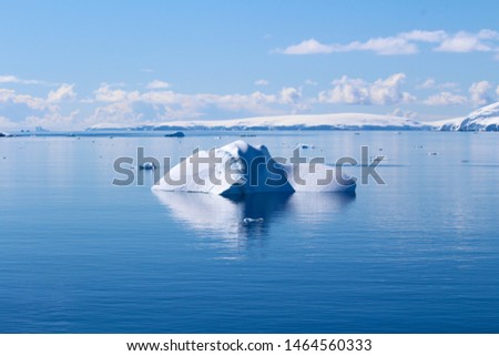 An iceberg among the islands around the Antarctic peninsula, Palmer Archipelago, Antarctica