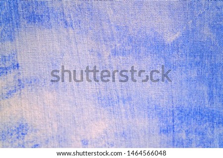 Blue sky with white clouds on canvas texture background. close-up, selective focus.