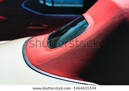  with a red roof in the parking lot Royalty-Free Stock Photo #1464635144