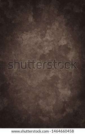 Brown portrait backdrop. Great for replacing the background on a green-screen shoot. It has a nice texture.