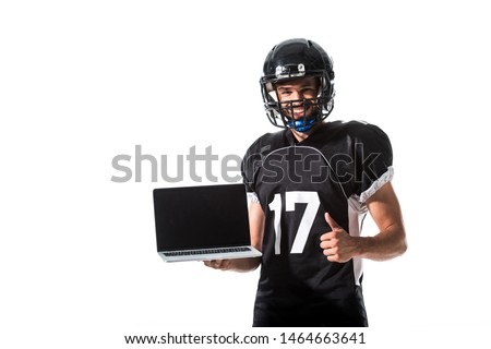 American Football player with laptop showing thumb up Isolated On White