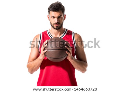 handsome basketball player holding ball Isolated On White  Royalty-Free Stock Photo #1464663728