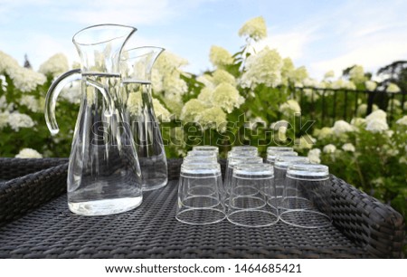 Jug of water with glasses - picture