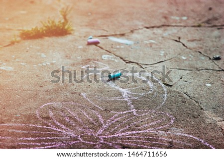 Children's drawing on asphalt on children's day
