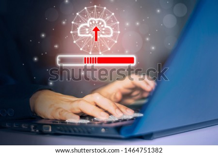 woman using hand touch keyboard laptop computer,dark background with symbol cloud, Concept collect data cloud computing technology speed download,uploading data,search engine system Industry 4.0