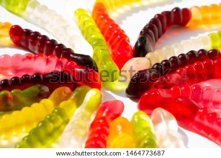 Coloured jelly worms funny background