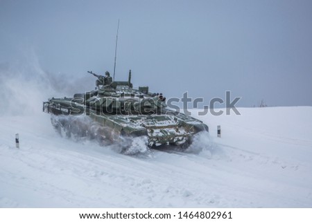 Winter tanks at the trainin Royalty-Free Stock Photo #1464802961