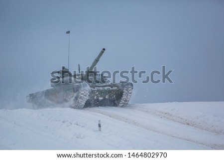 Winter tanks at the trainin Royalty-Free Stock Photo #1464802970