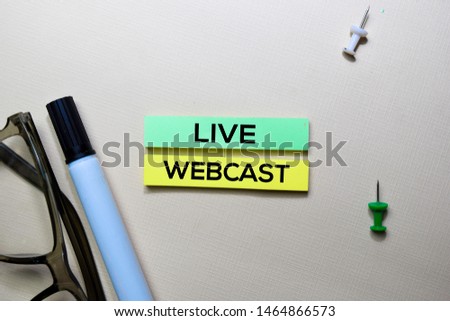 Live Webcast text on sticky notes isolated on office desk Royalty-Free Stock Photo #1464866573