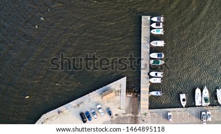 aerial top down shot of some boats docked at East Islip Marina & Park in Suffolk County on Long Island New York in the summer at sunset