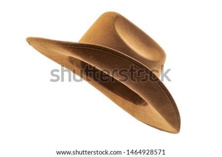 Rodeo horse rider, wild west culture, Americana and american country music concept theme with side view of a brown leather cowboy hat isolated on white background with clip path cut out