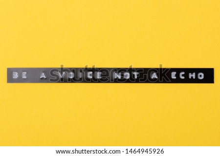 Text Be a Voice not a Echo printed with a Labelprinter on yellow Background